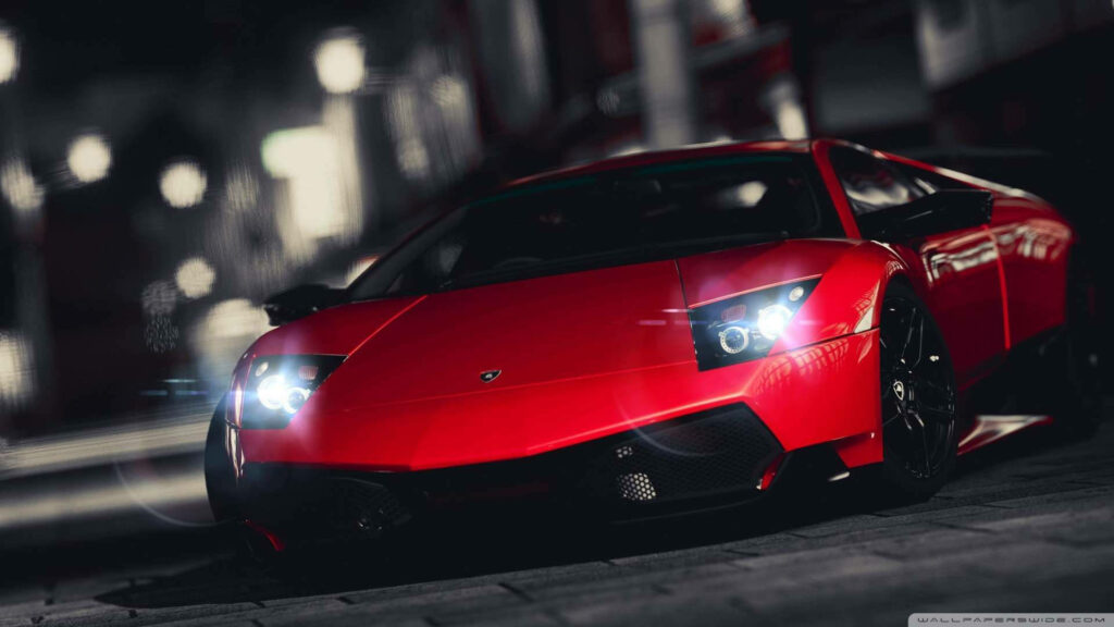 Red Lamborghini sports car with sleek design and headlights in moody urban iPhone wallpaper