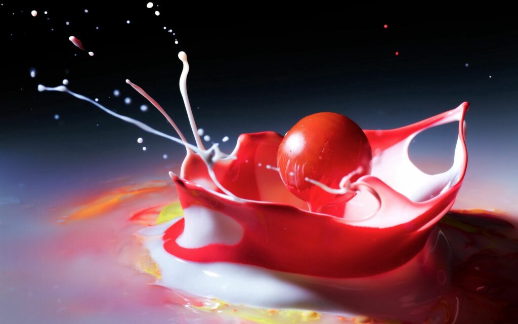 Dynamic Red Liquid Splash Wallpaper: Intricate Droplets in Motion