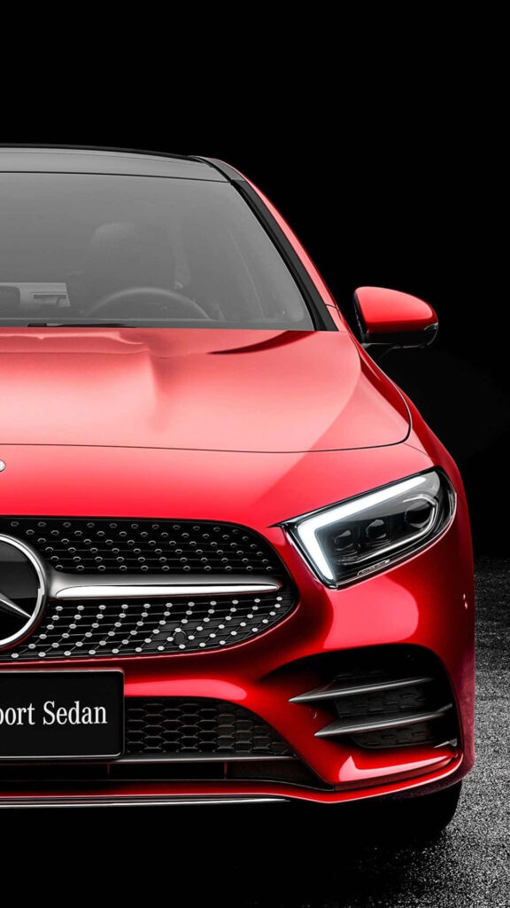 Front view of red Mercedes-Benz sport sedan wallpaper for car enthusiasts and luxury lovers