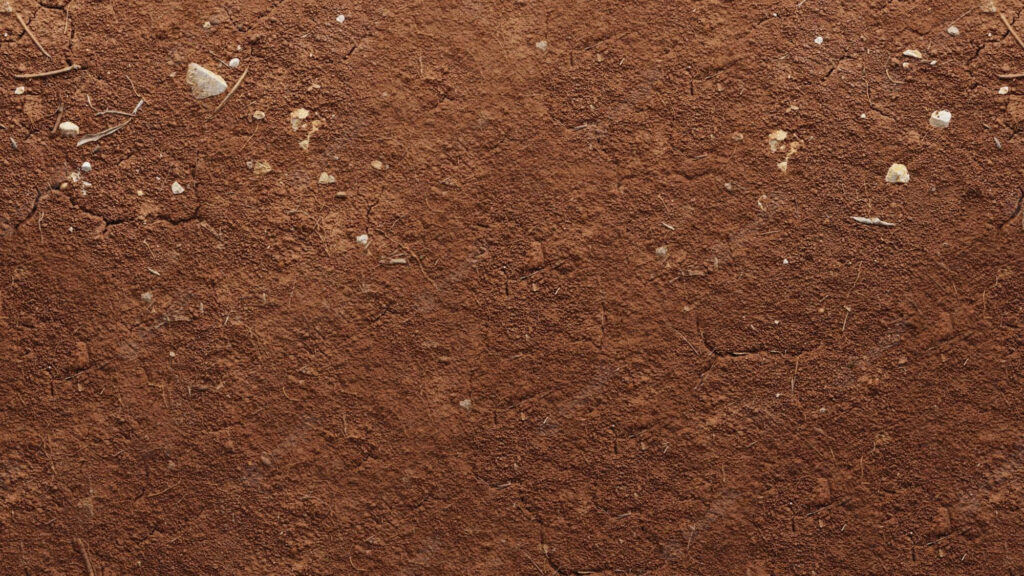 Rich Red Mud Soil Texture: Earthy Wallpaper Background with Fine Details