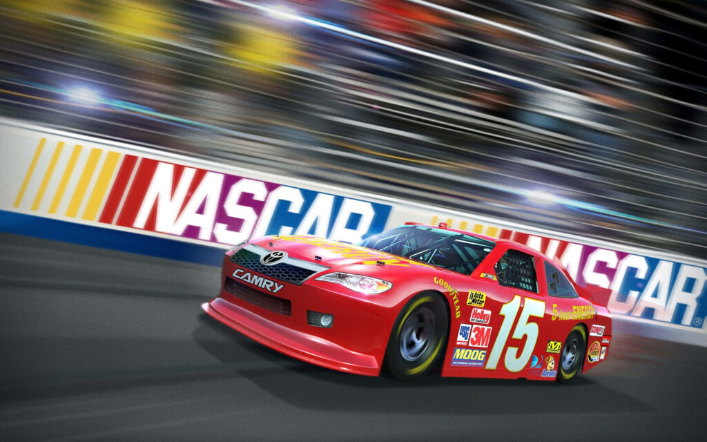 Red NASCAR race car speeding on track with motion blur vibrant stock car racing wallpaper