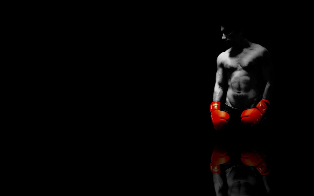 Unleashing Fury: Red Glove Boxing Phenom Illuminates in Stunning Highlight Photo Wallpaper