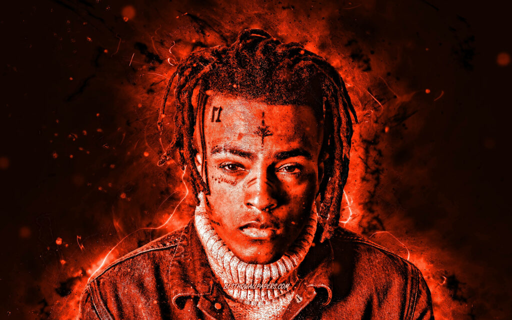 Fiery Atmosphere: Xxxtentacion's Bold Computer Screen Background Wallpaper