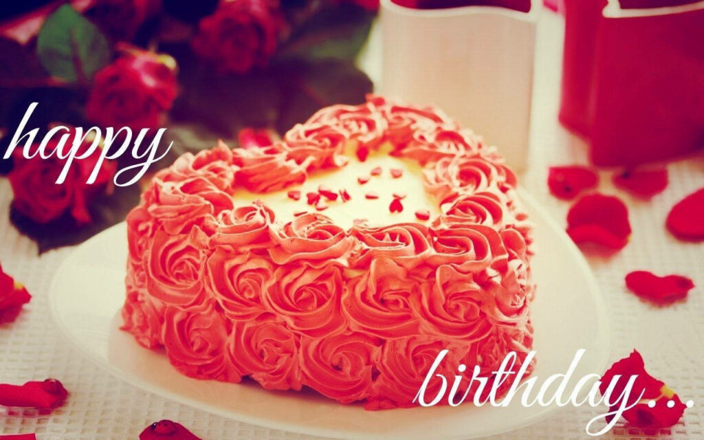 Vibrant Red Birthday Cake adorned with Artistic Rose-Patterned Icing - Background Photo Wallpaper