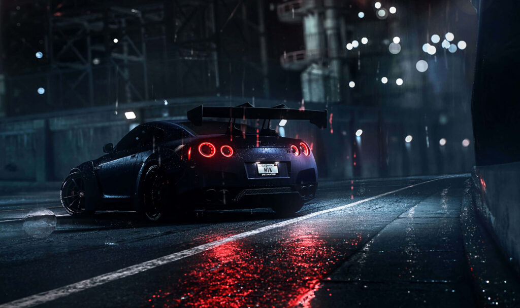 Sleek red sports car speeding on wet night road with glowing city lights wallpaper background