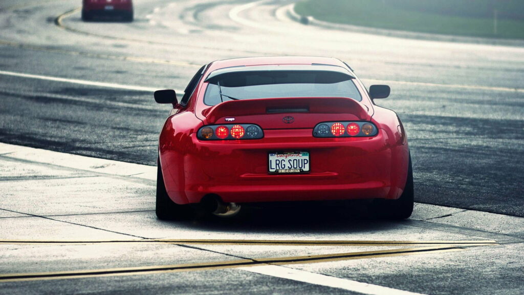 Speed Redefined: Jaw-Dropping JDM Toyota Supra Graces QHD Wallpaper with Its Powerful Charisma