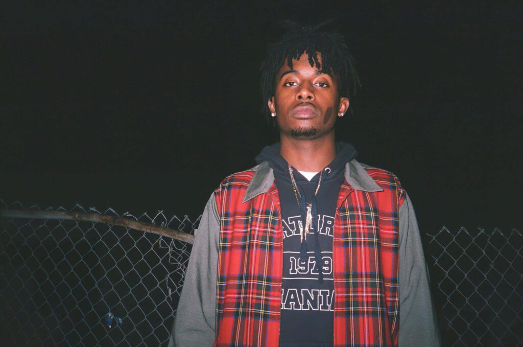 Plaid Out: Playboi Carti's Stylish Jacket Pfp Wallpaper