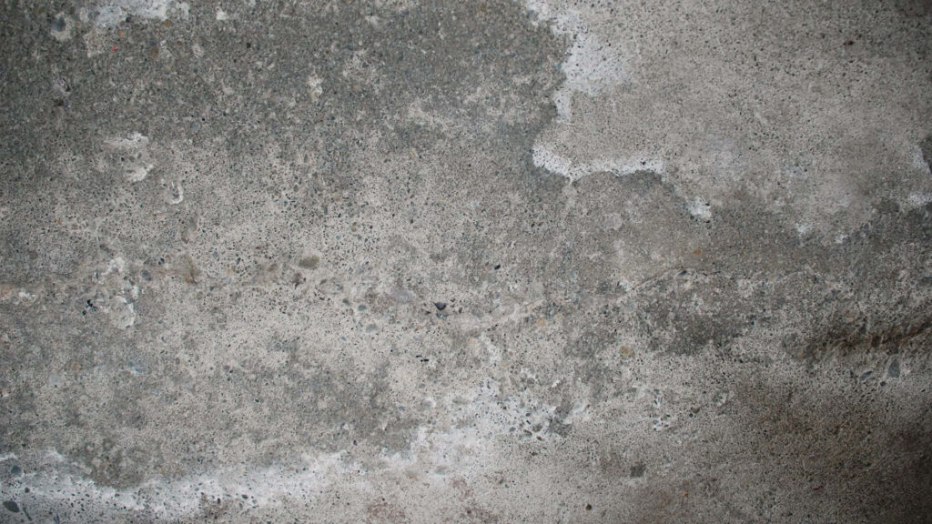Refined Concrete Texture Wallpaper: Weathered Gray Surface with Imperfections