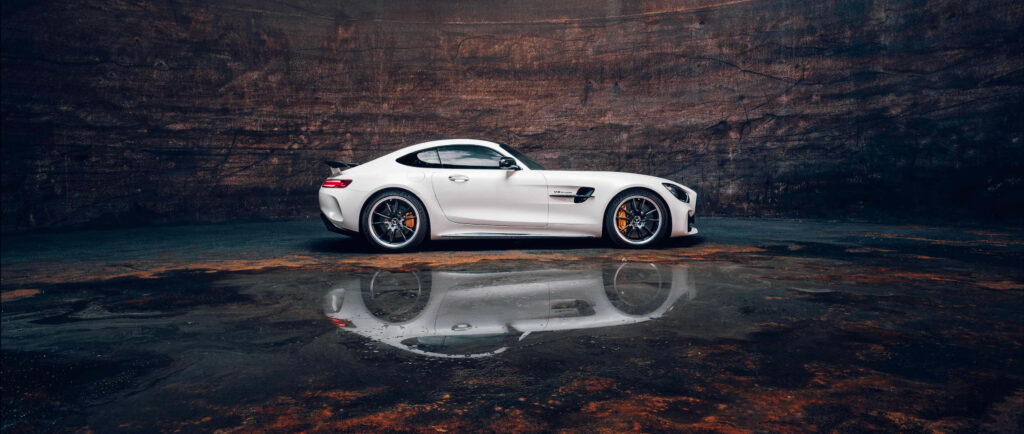 Reflecting Brilliance: Stunning Mercedes AMG GT Wallpaper