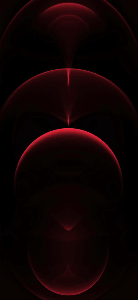 The Radiant Aura of iPhone 11 Pro: Mesmerizing Red Light Circle Reflections Wallpaper