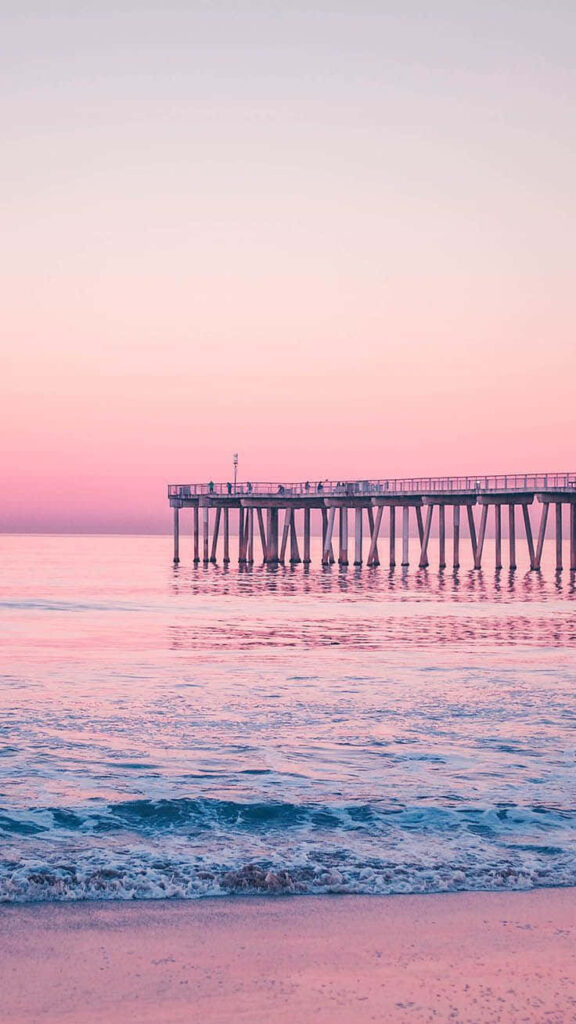 Beautiful pink Gradient Pier and Ocean Wallpaper