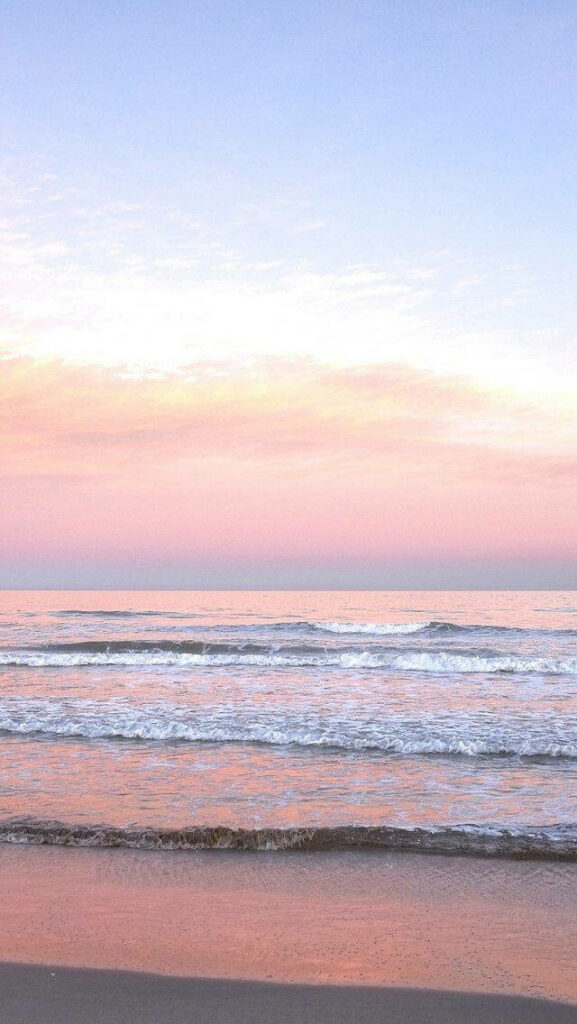 Captivating Pink Sunset Reflection Over Ocean: Perfect iPhone Background Wallpaper