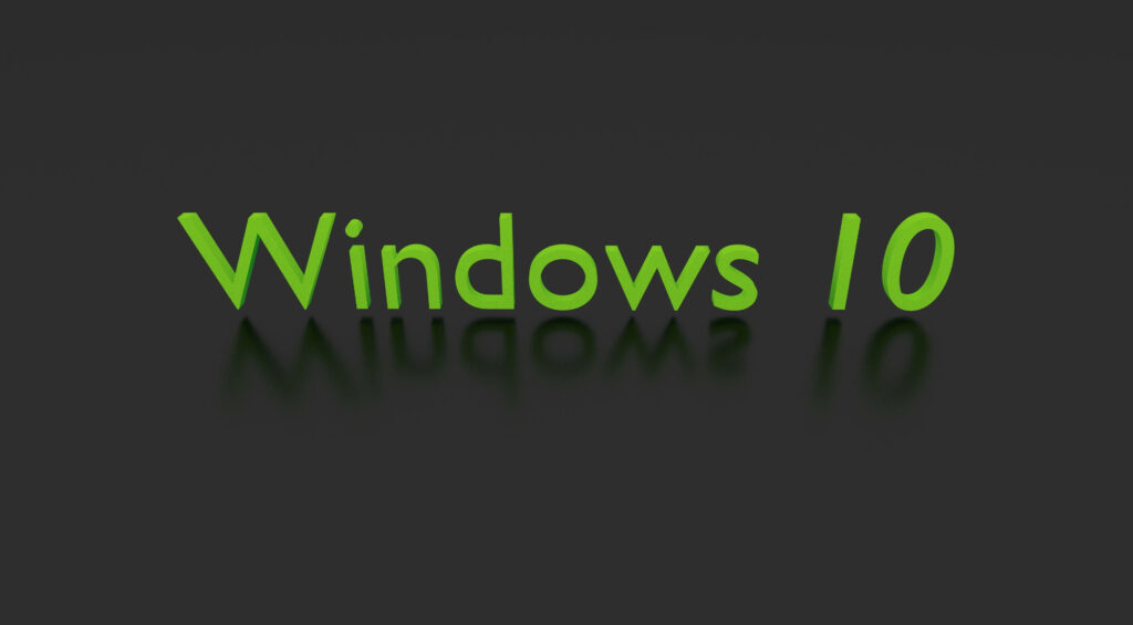 Reflective Green Windows 10 Wordmark Shines on Sleek Black Surface - High Definition Windows 10 Background Image Wallpaper