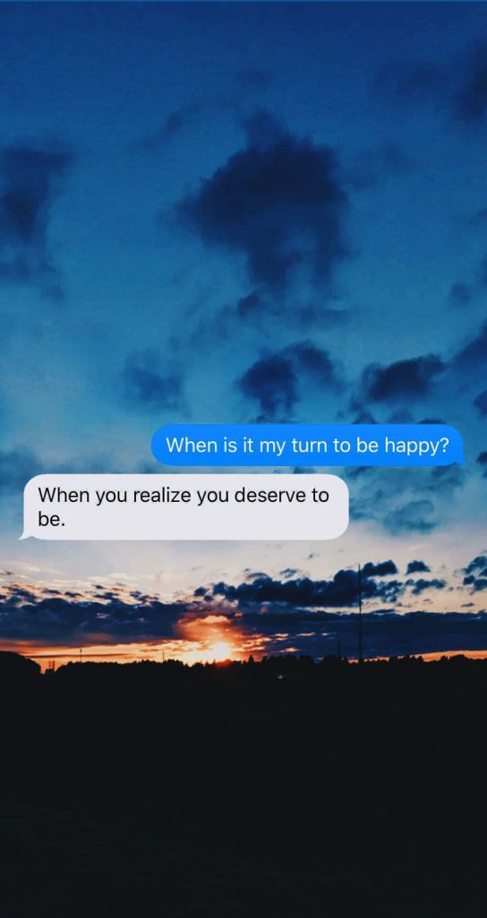 Silhouetted sunset wallpaper with heartfelt text about happiness and self-worth on blue sky