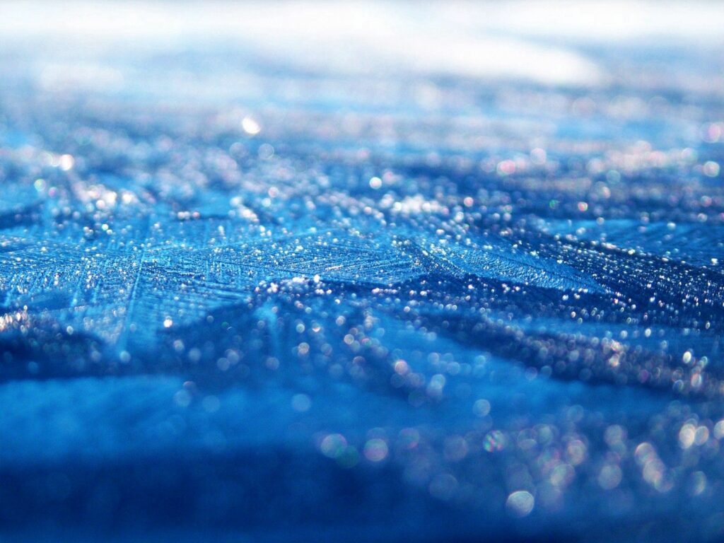 Refreshing Blue Dew Drops Wallpaper Background - Serene Close-Up