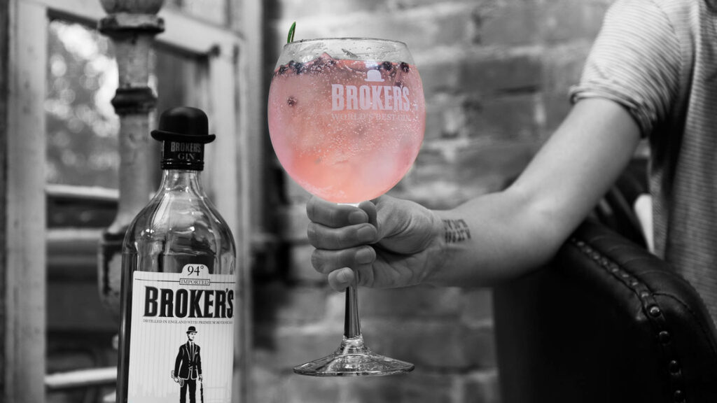 Refreshing Brokers Gin Tonic Cocktail in Elegant Setting Wallpaper