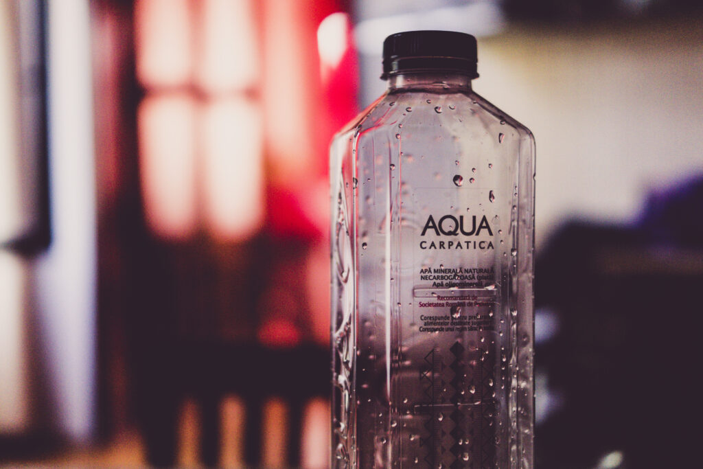 Refreshing Water Droplets on Clear Plastic Bottle - Nature Wallpaper