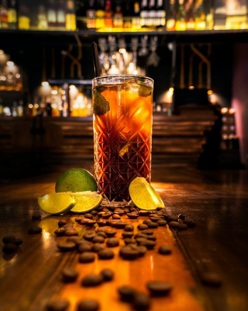 Refreshing Cocktail in Patterned Glass with Lime & Coffee Beans Wallpaper