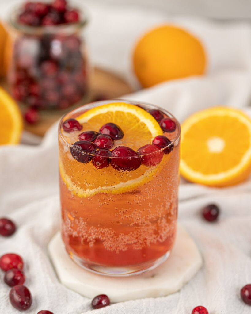 Vibrant Orange & Cranberry Cocktail: Refreshing Wallpaper Background