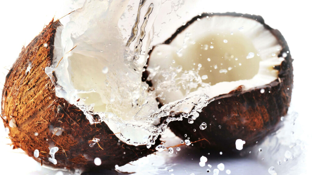Tropical Coconut Splash Wallpaper: Freshly Sliced Beauty