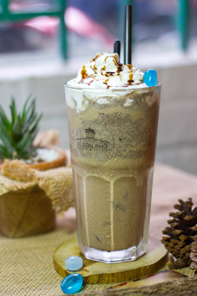 Refreshing Creamy Dessert Drink in Tall Glass - Whipped Cream & Syrup Wallpaper
