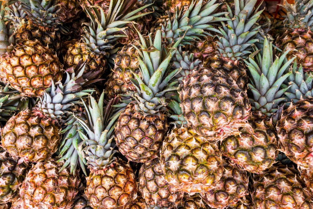 Deliciously Ripe Pineapple Medley: A Tempting Tropical Treat to Savor! Wallpaper