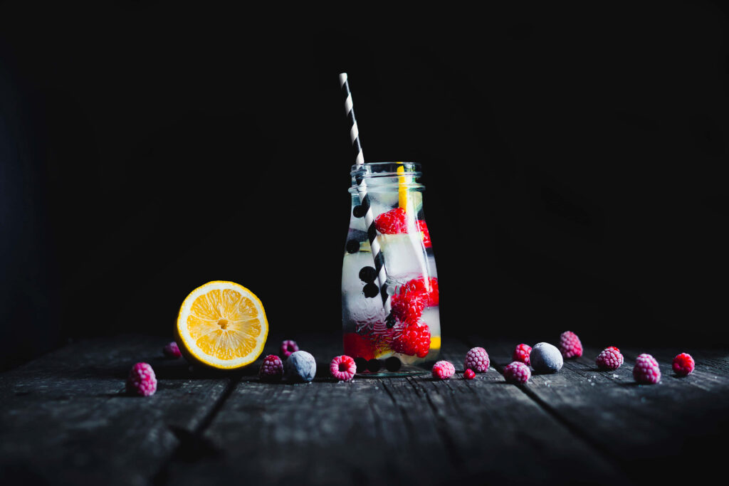Refreshing Fruit Beverage in Jar: Rustic Wallpaper with Berries