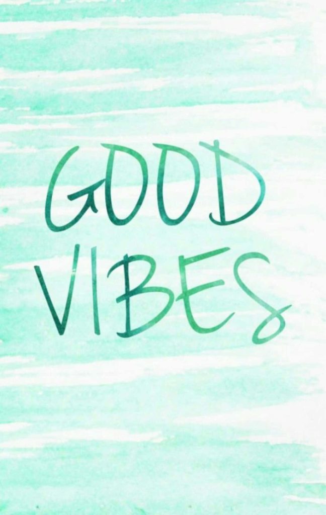 Mint green Good Vibes iPhone wallpaper with dark green handwritten text and watercolor background