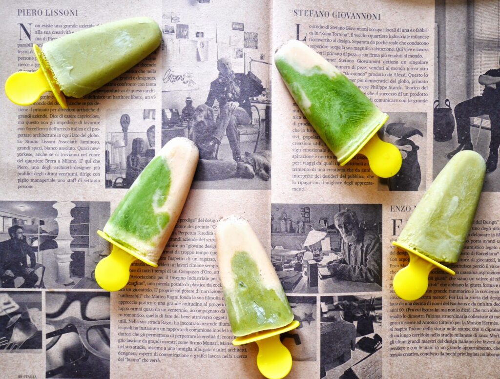Refreshing Matcha Popsicles on Vintage Newspaper Wallpaper Background