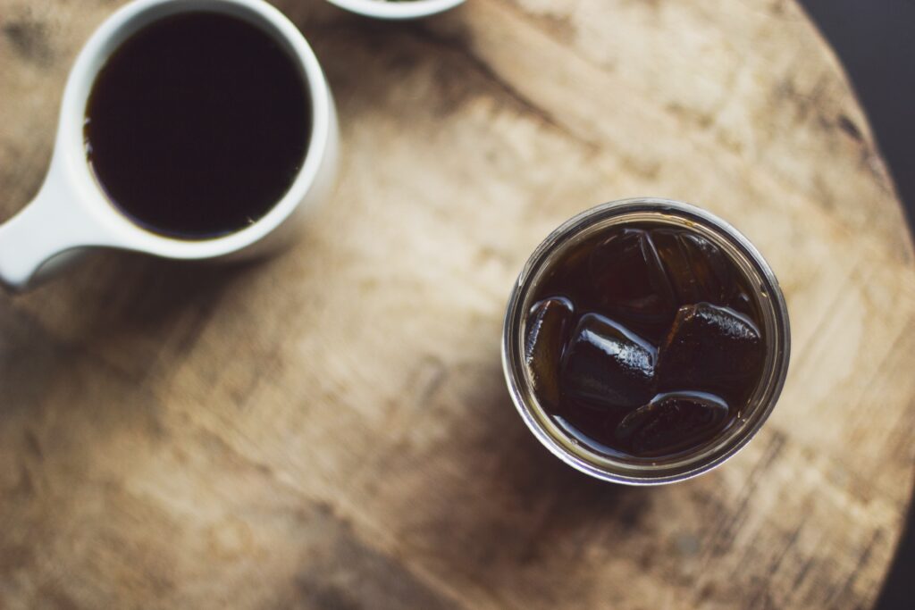 Charming Rustic Wallpaper: Iced & Black Coffee on Wood Surface