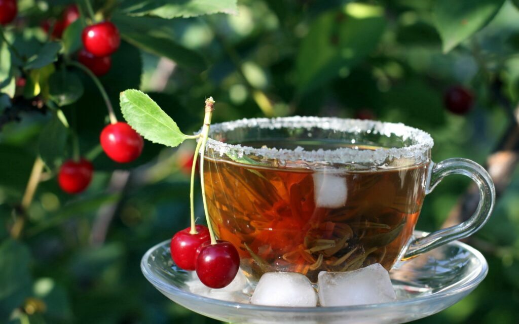 Iced Tea with Cherries: Vibrant Cherry Tree Wallpaper Background
