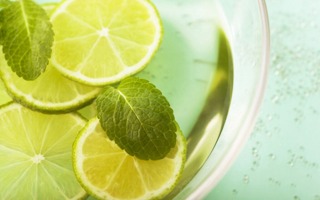 Refreshing Lemon & Mint Wallpaper: Bright Green Background