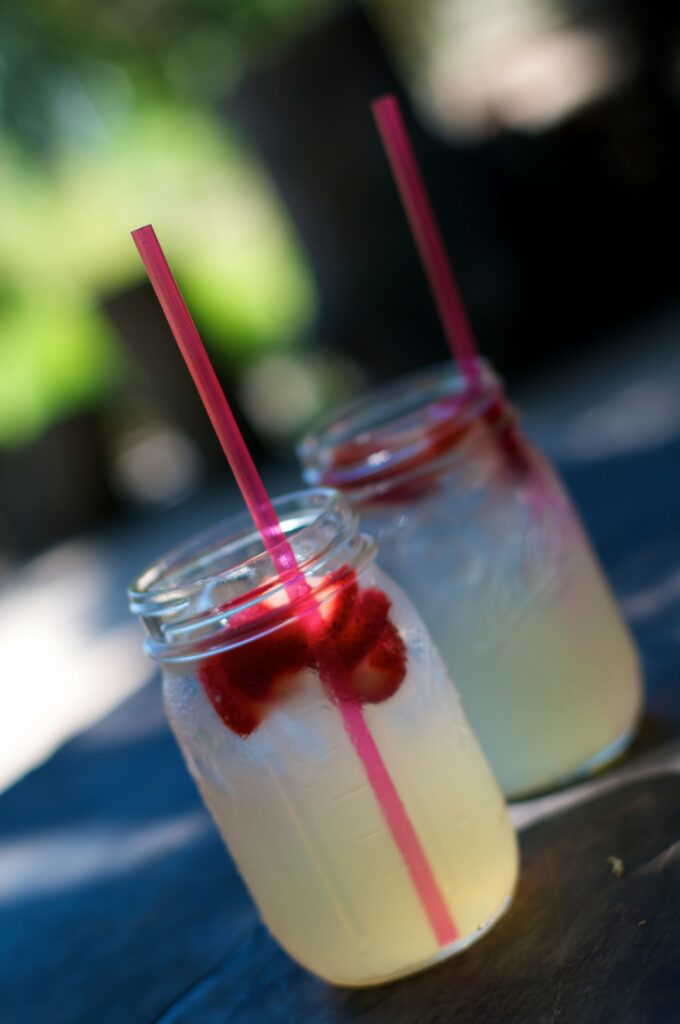 Refreshing Lemonade Wallpaper with Strawberries & Natural Background