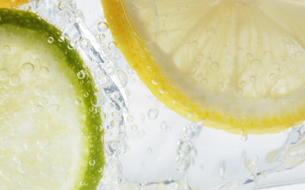 Refreshing Lemon & Lime Wallpaper: Bubbles & Water Splash Background