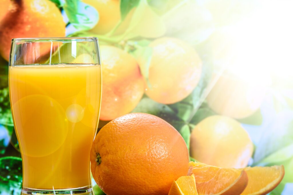 Refreshing Orange Juice Wallpaper: Vibrant Citrus Essence Background