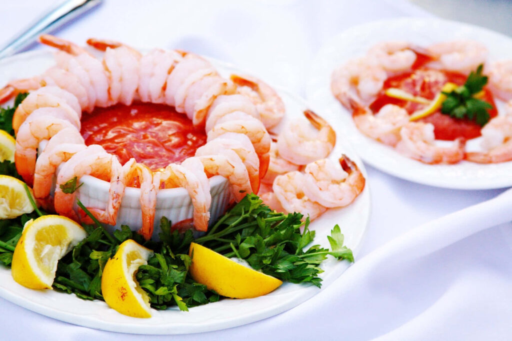 Wholesome Shrimp Cocktail Wallpaper: Tangy Sauce & Lemon Garnish