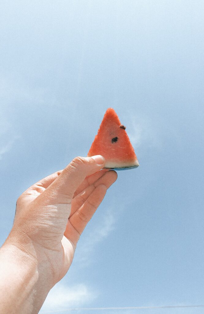 Vibrant Watermelon Summer Wallpaper Against Clear Blue Sky