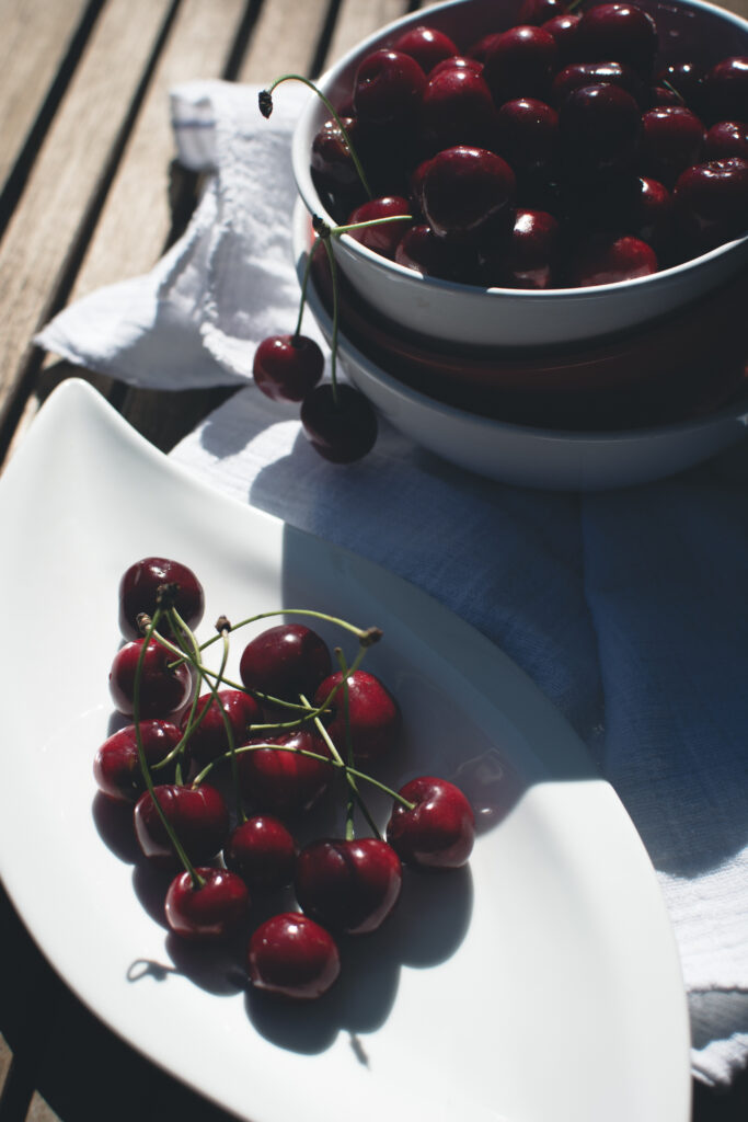 Summer Cherry Wallpaper: Fresh Cherries on Rustic Wooden Table