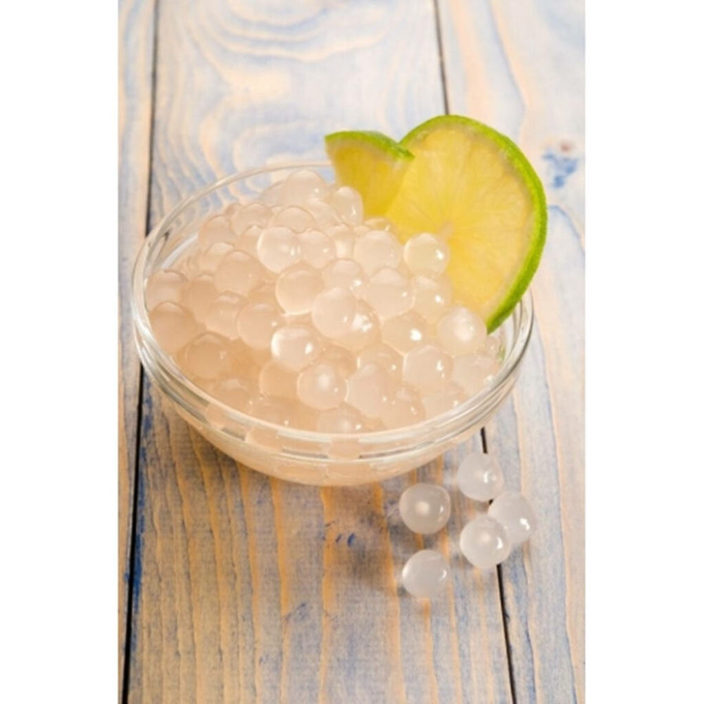 Refreshing Tapioca Pearls with Lime on Rustic Wood Wallpaper