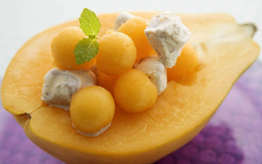 Delightful Tropical Papaya Dessert Wallpaper Background