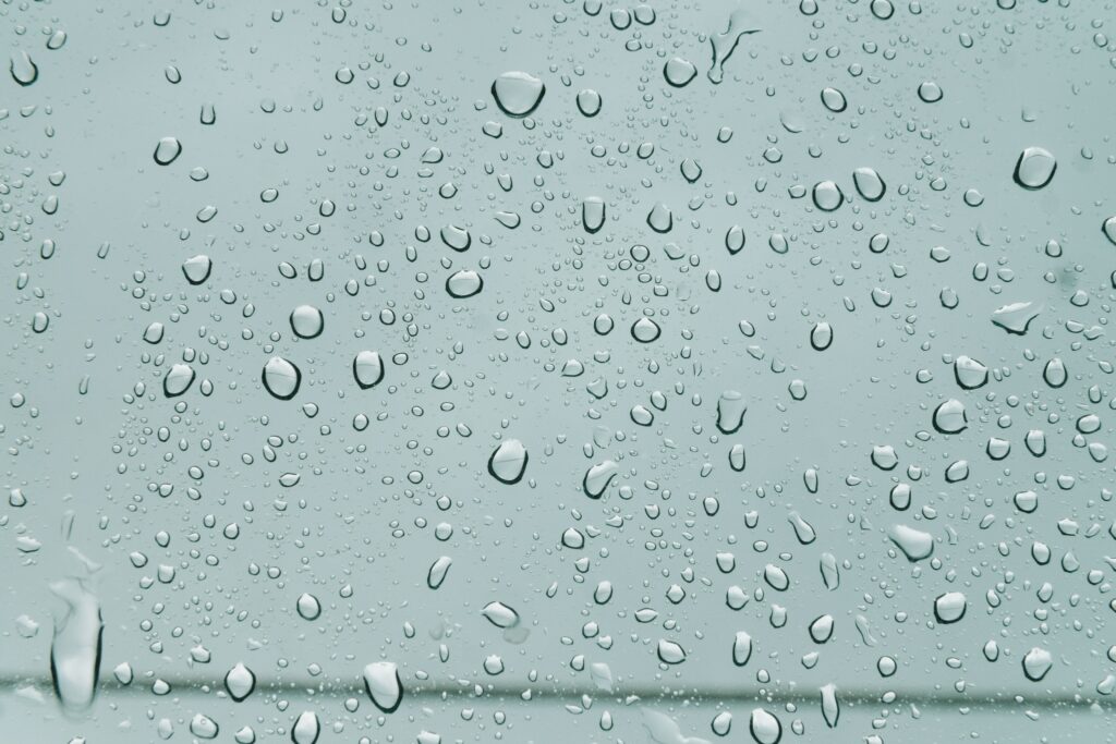 Refreshing Water Droplet Wallpaper Background on Smooth Surface