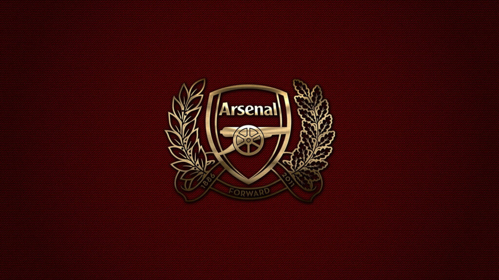Regal gold Arsenal FC logo on maroon background with laurel accents showcasing heritage wallpaper