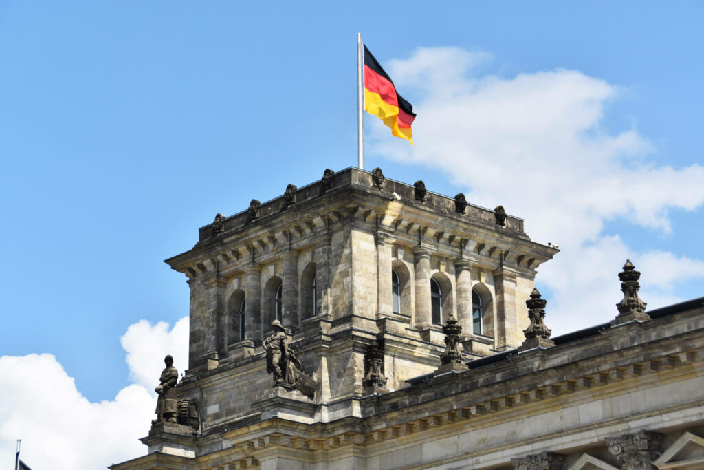 Reichstag Building Wallpaper: Historic Architecture with German Flag