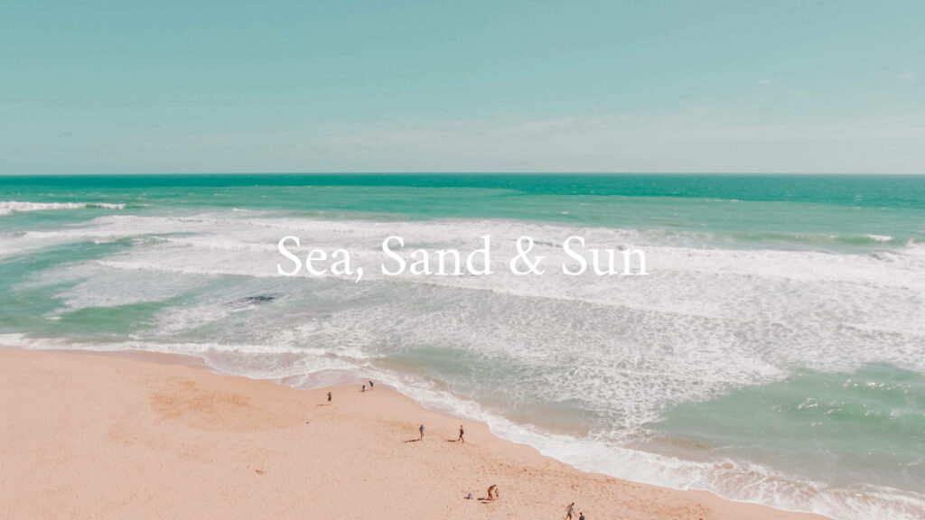 Tranquil Summer Beach Wallpaper: Clear Sea & Sunny Serenity