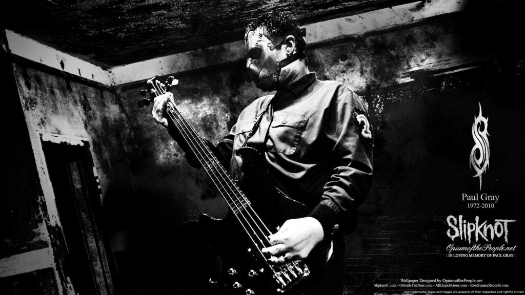 Remembering Paul Gray: A Tribute to Slipknot's Legendary Bassist in Black and White Wallpaper