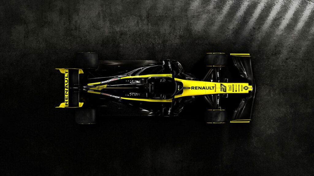 Sleek Renault F1 Car Wallpaper: Black & Yellow on Dark Background