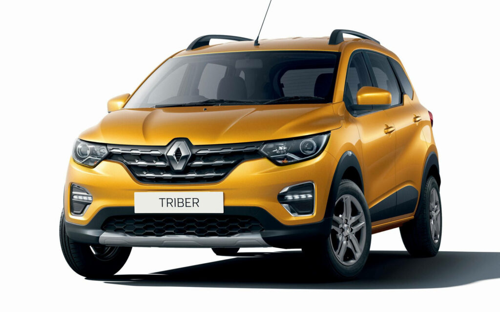 Renault Triber Wallpaper: Sleek SUV Design in Bold Golden Color