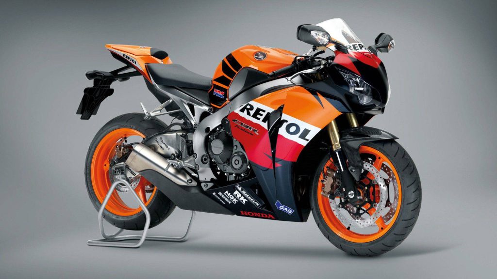Repsol Honda CBR Fireblade sportbike with aggressive design and racing livery wallpaper background
