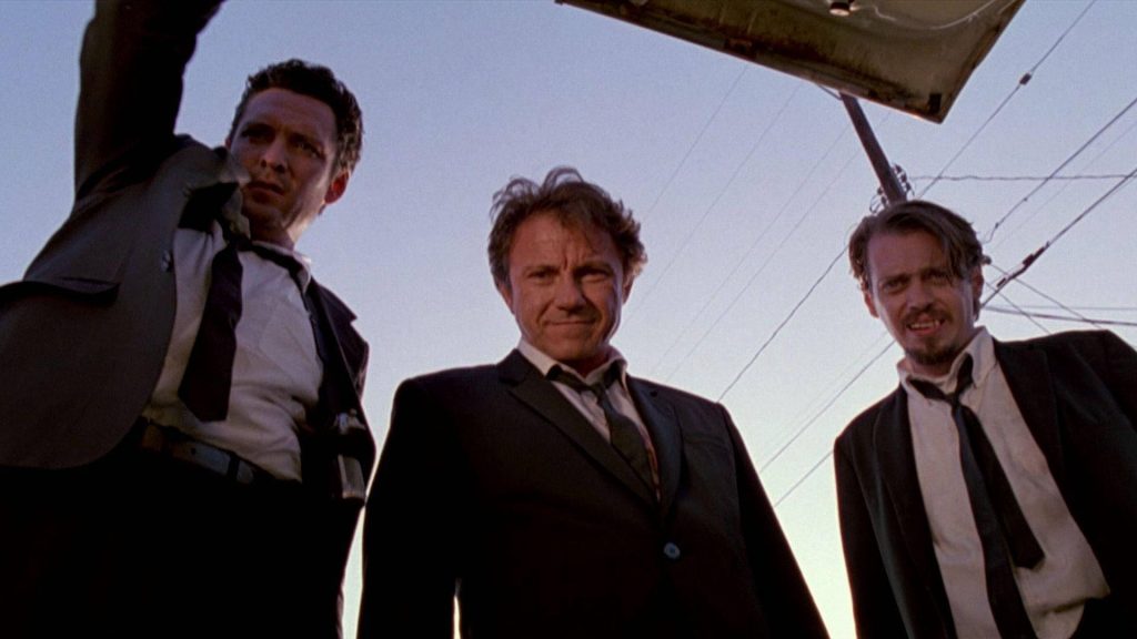 Reservoir Dogs trunk shot with Harvey Keitel Michael Madsen Steve Buscemi in suits menacing Wallpaper