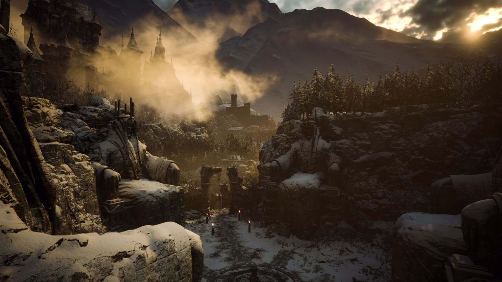 Snowy path to Castle Dimitrescu with gothic statues at golden sunset Resident Evil Village wallpaper